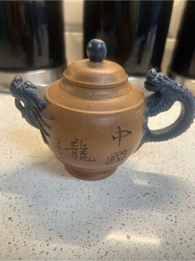 Dragon-Handled Brown Teapot with Dark Blue Accents